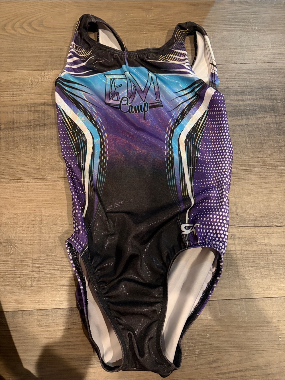 Dominique Moceanu Girls' Purple & Black gymnastics Leotard. AXS